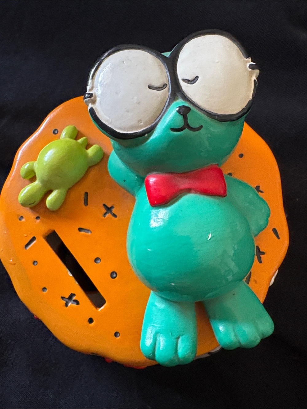 This vintage 1996 Sanrio Rolé Molé ceramic coin bank